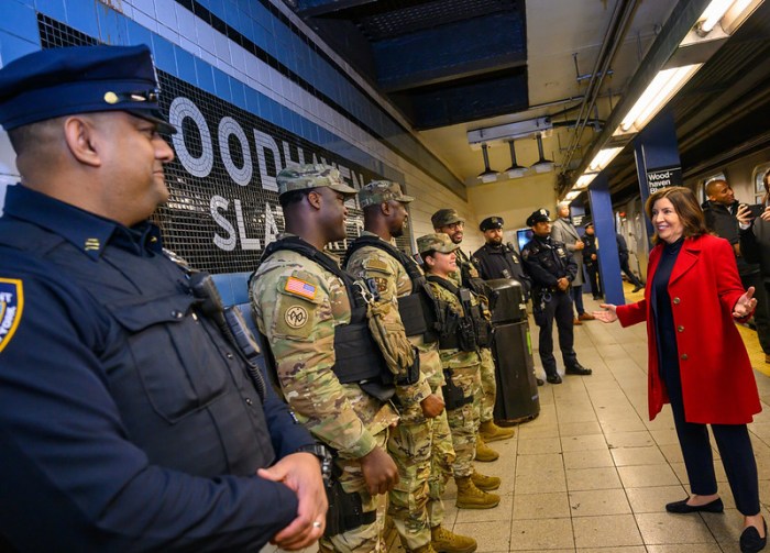 Hochul meets with members of the National Guard and NYPD officers at the Woodhaven Blvd Subway station. Photo: Kathy Hochul Flickr.