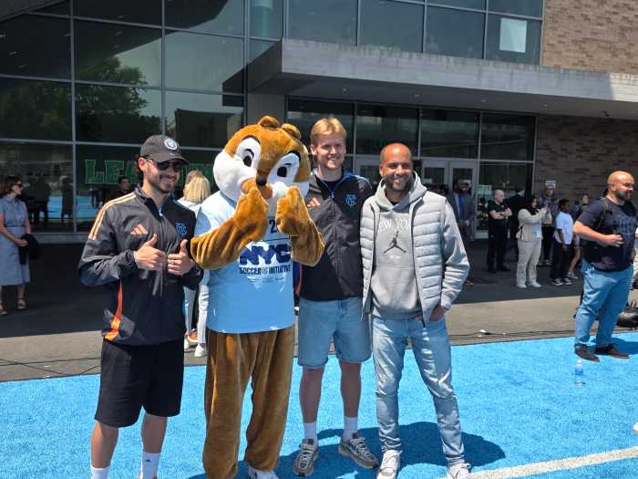 NYCFC's O'Toole, Parks and Jansen pose with PS 211 mascot "chippy". Photo: Shane O'Brien