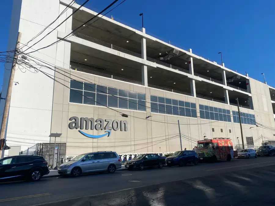 A former employee at the DBK4 Amazon warehouse in Maspeth was criminally charged for allegedly stealing 1,838 pairs of work boots and sneakers and reselling them online for nearly $225,000, according to the Queens DA's office.
