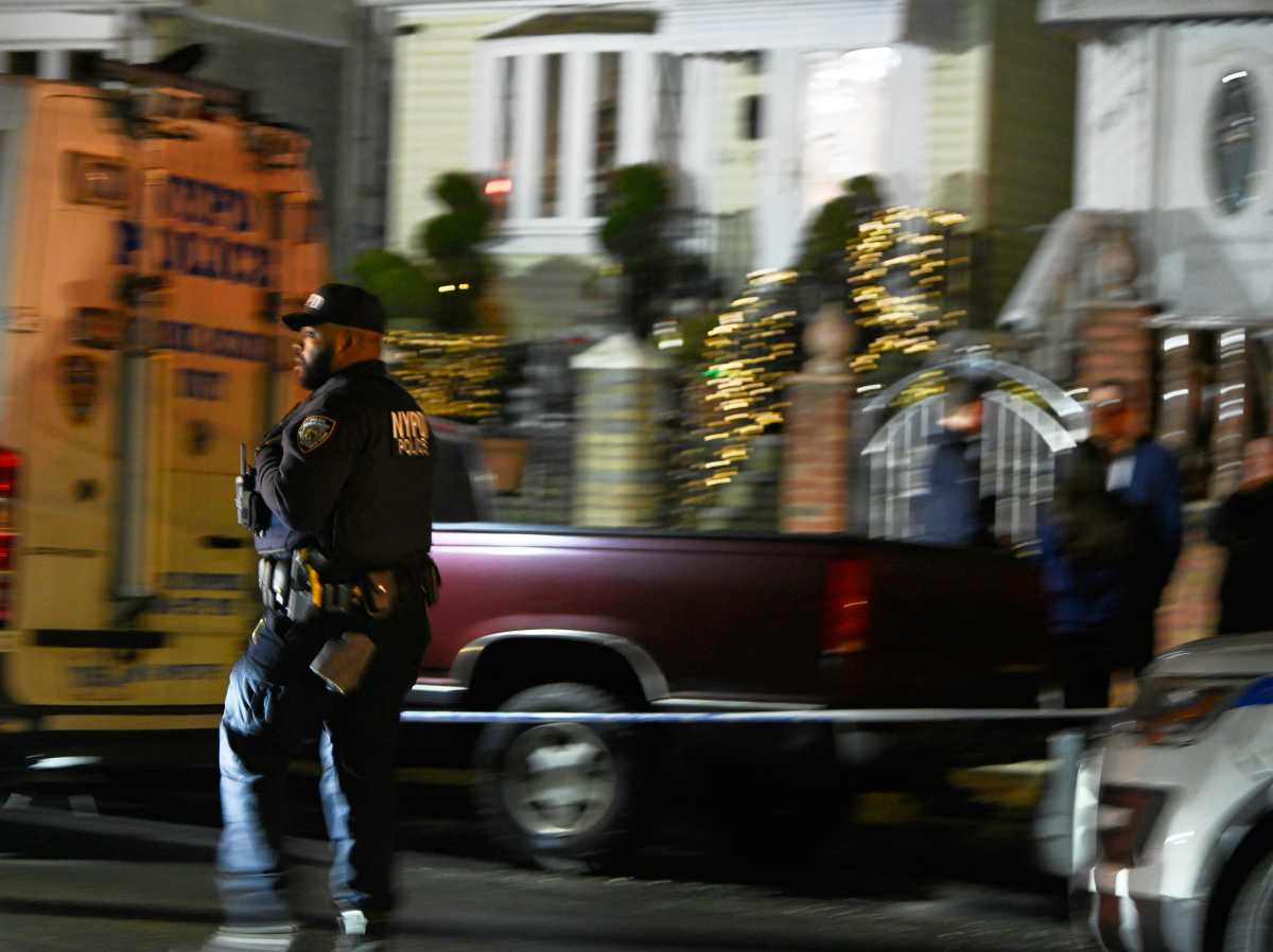 A 45-year-old Elmhurst man was found bleeding heavily from multiple stab wounds in a cellar stairwell in the Case Street home.