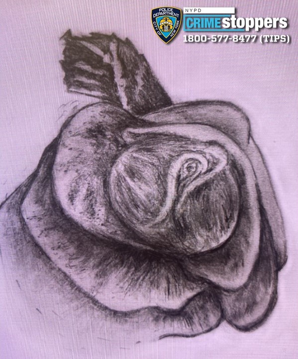 A rose tattoo is located on the woman's upper left buttocks.